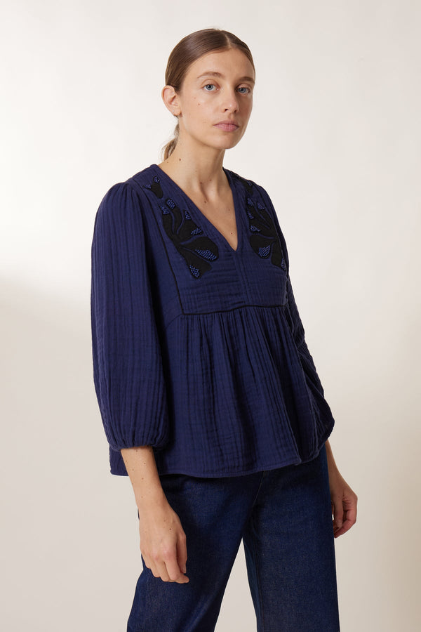 Camicia blu perline